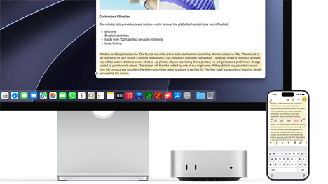 Mac mini esikülg, Studio Display alla paigutatud, iPhone seadme ja ekraani paremal küljel, iPhone’is valitud tekst koos selle kohal kuvatavate Cut-, Copy-, Paste- ja AutoFill-käskudega vastab ekraanil esiletõstetud tekstile, esitledes Universal Clipboardi