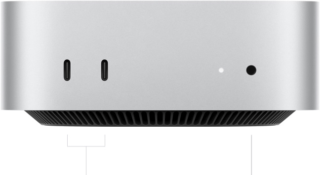 Mac mini, bagian depan, dua port Thunderbolt, lampu indikator status dan jek headphone, bagian bawah hitam yang menyempit, bagian atas datar, sisi melengkung, tepian lurus, warna perak